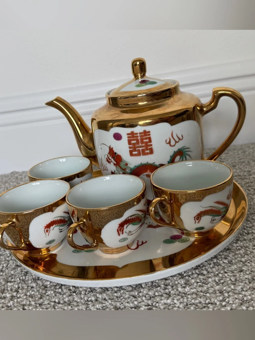 Porcelain tea set with Chinese deagon motifs